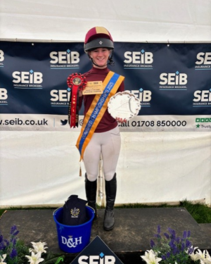Riding to Glory: Junior Championship Title Earned
